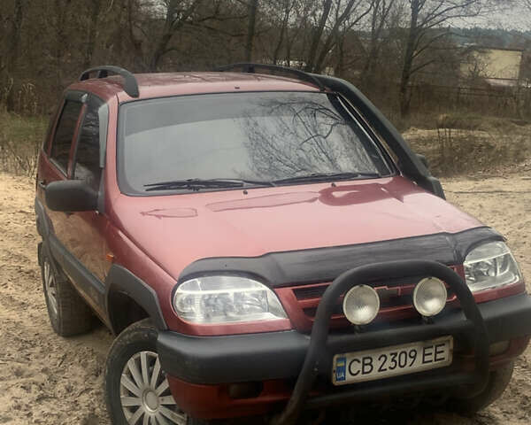 Красный ВАЗ 2123 Niva, объемом двигателя 1.69 л и пробегом 217 тыс. км за 3900 $, фото 3 на Automoto.ua