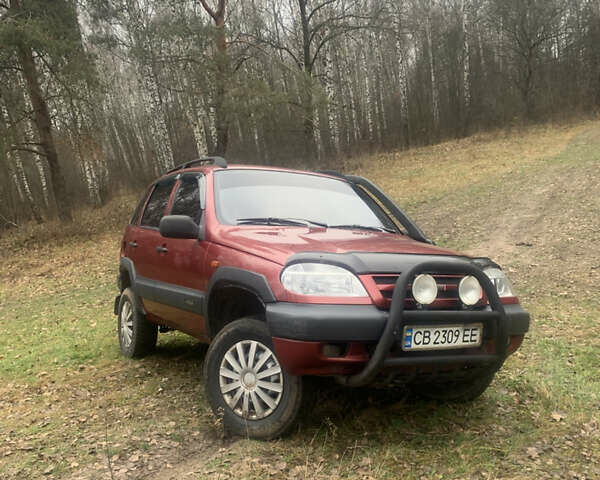 Красный ВАЗ 2123 Niva, объемом двигателя 1.69 л и пробегом 217 тыс. км за 3900 $, фото 1 на Automoto.ua