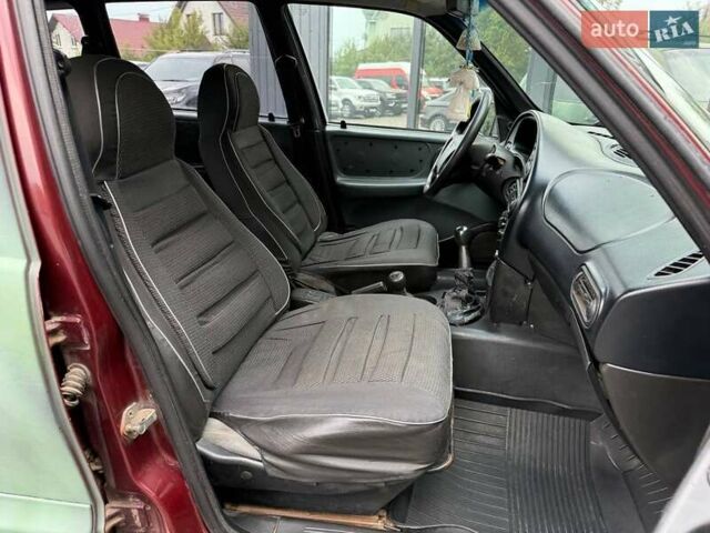 Червоний ВАЗ 2123 Niva, об'ємом двигуна 1.69 л та пробігом 222 тис. км за 3500 $, фото 20 на Automoto.ua