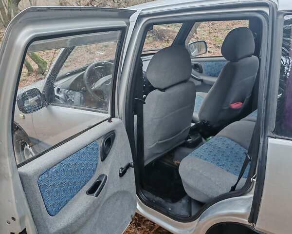 Серый ВАЗ 2123 Niva, объемом двигателя 1.69 л и пробегом 350 тыс. км за 2900 $, фото 5 на Automoto.ua