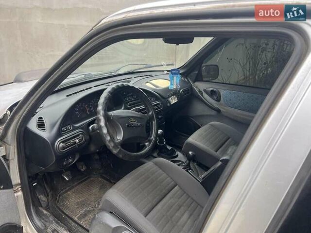 Серый ВАЗ 2123 Niva, объемом двигателя 1.7 л и пробегом 100 тыс. км за 3500 $, фото 7 на Automoto.ua