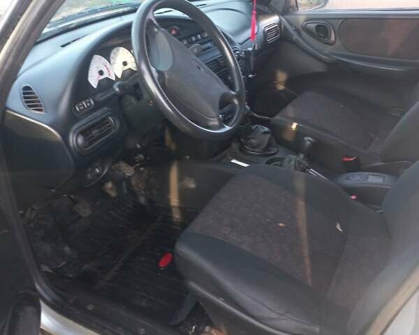 Серый ВАЗ 2123 Niva, объемом двигателя 1.69 л и пробегом 94 тыс. км за 3250 $, фото 6 на Automoto.ua