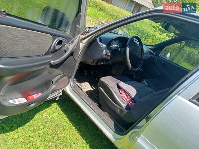 Сірий ВАЗ 2123 Niva, об'ємом двигуна 1.69 л та пробігом 326 тис. км за 2900 $, фото 6 на Automoto.ua