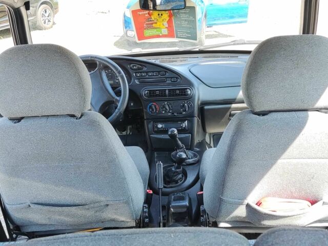 Серый ВАЗ 2123 Niva, объемом двигателя 1.69 л и пробегом 360 тыс. км за 2900 $, фото 12 на Automoto.ua