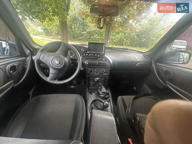 Сірий ВАЗ 2123 Niva, об'ємом двигуна 1.69 л та пробігом 132 тис. км за 8500 $, фото 5 на Automoto.ua