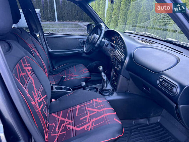 Серый ВАЗ 2123 Niva, объемом двигателя 1.69 л и пробегом 78 тыс. км за 9600 $, фото 6 на Automoto.ua