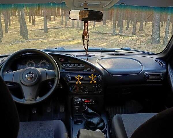 Сірий ВАЗ 2123 Niva, об'ємом двигуна 1.69 л та пробігом 60 тис. км за 11500 $, фото 29 на Automoto.ua