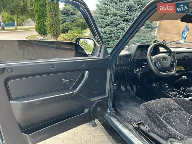 Зеленый ВАЗ 2123 Niva, объемом двигателя 1.69 л и пробегом 250 тыс. км за 4450 $, фото 12 на Automoto.ua
