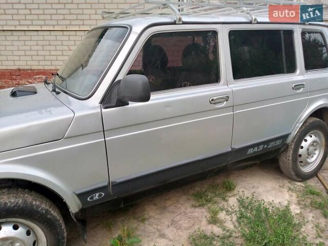 Серый ВАЗ 2131 Нива, объемом двигателя 1.69 л и пробегом 73 тыс. км за 6500 $, фото 3 на Automoto.ua