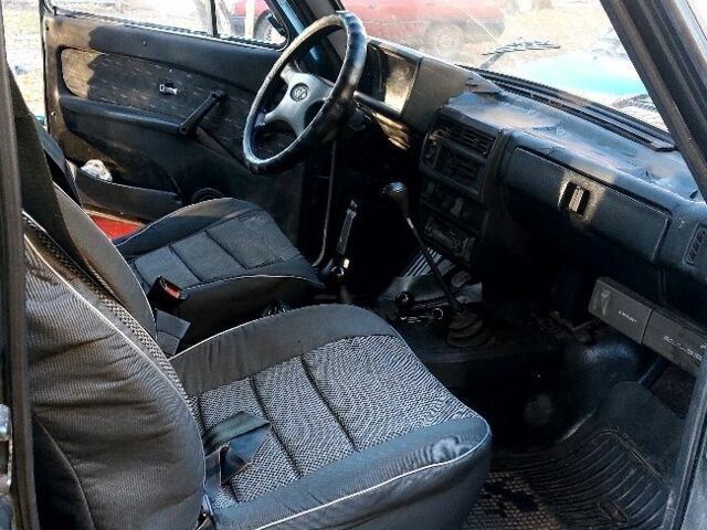 Зелений ВАЗ 2131 Нива, об'ємом двигуна 1.7 л та пробігом 250 тис. км за 2464 $, фото 4 на Automoto.ua