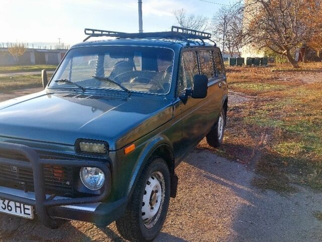 Зелений ВАЗ 2131 Нива, об'ємом двигуна 1.7 л та пробігом 250 тис. км за 2464 $, фото 2 на Automoto.ua