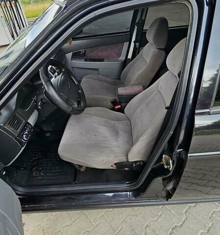 Черный ВАЗ 2170 Priora, объемом двигателя 1.6 л и пробегом 200 тыс. км за 1601 $, фото 2 на Automoto.ua