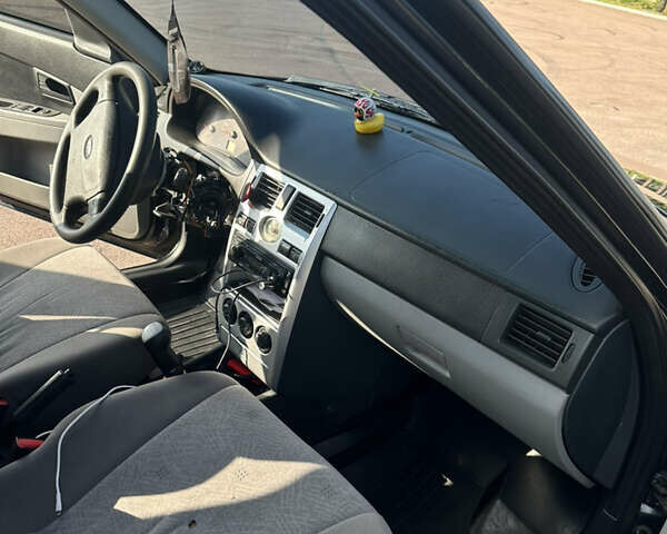 Черный ВАЗ 2170 Priora, объемом двигателя 1.6 л и пробегом 170 тыс. км за 2899 $, фото 18 на Automoto.ua