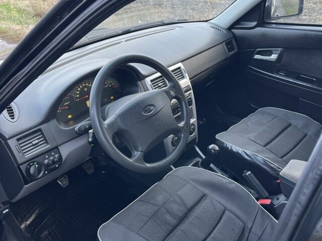 Черный ВАЗ 2170 Priora, объемом двигателя 1.6 л и пробегом 157 тыс. км за 1750 $, фото 10 на Automoto.ua