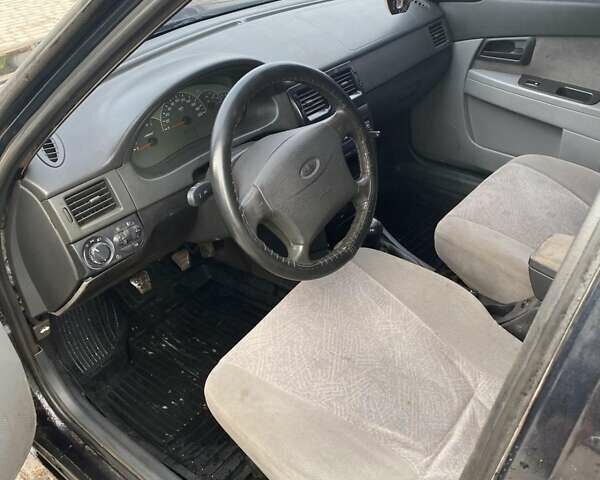 Чорний ВАЗ 2170 Priora, об'ємом двигуна 1.6 л та пробігом 450 тис. км за 1999 $, фото 4 на Automoto.ua