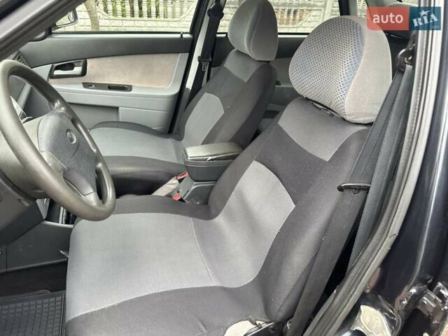 Черный ВАЗ 2170 Priora, объемом двигателя 1.6 л и пробегом 234 тыс. км за 2699 $, фото 47 на Automoto.ua