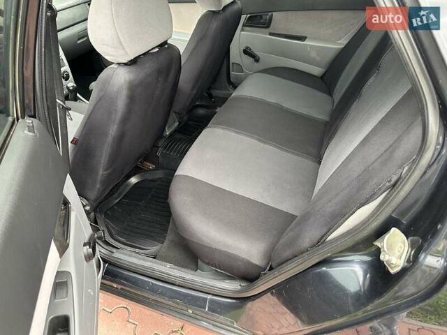 Черный ВАЗ 2170 Priora, объемом двигателя 1.6 л и пробегом 234 тыс. км за 2699 $, фото 40 на Automoto.ua