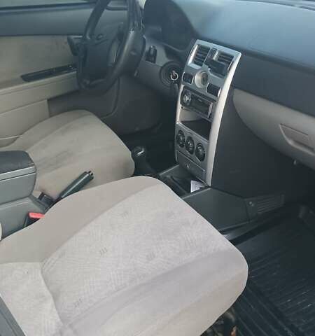 Черный ВАЗ 2170 Priora, объемом двигателя 1.6 л и пробегом 166 тыс. км за 2750 $, фото 2 на Automoto.ua