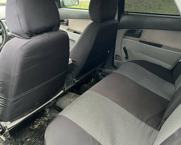 Черный ВАЗ 2170 Priora, объемом двигателя 1.6 л и пробегом 262 тыс. км за 2504 $, фото 4 на Automoto.ua