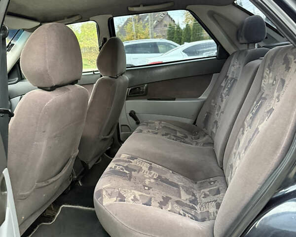 Черный ВАЗ 2170 Priora, объемом двигателя 1.6 л и пробегом 262 тыс. км за 1250 $, фото 21 на Automoto.ua