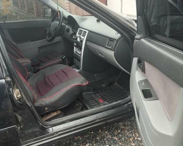 Черный ВАЗ 2170 Priora, объемом двигателя 1.6 л и пробегом 161 тыс. км за 2000 $, фото 3 на Automoto.ua