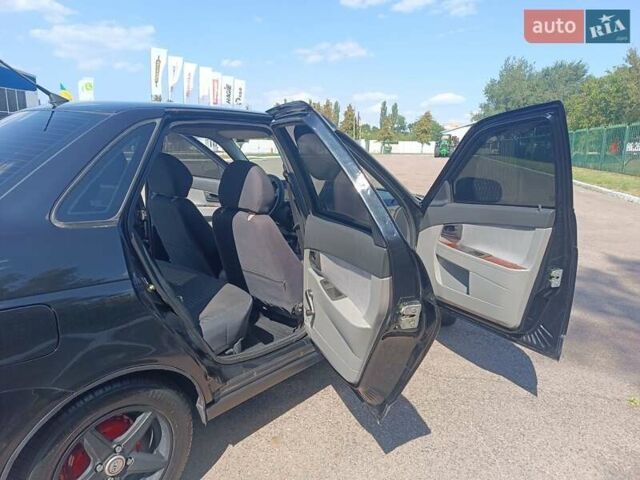 Черный ВАЗ 2170 Priora, объемом двигателя 1.6 л и пробегом 115 тыс. км за 3000 $, фото 3 на Automoto.ua