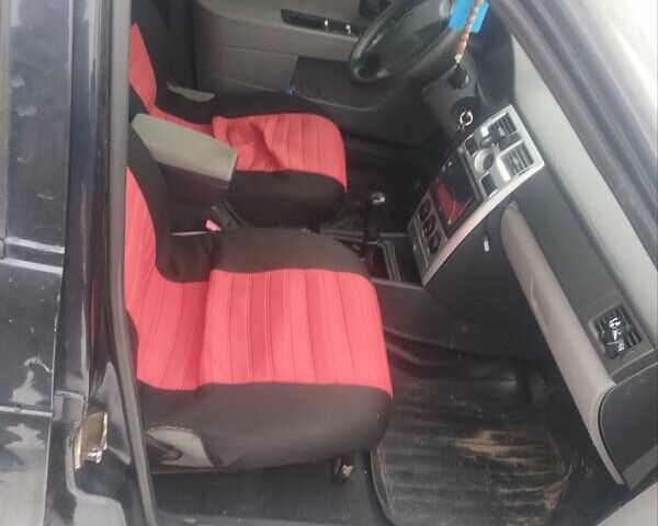 Черный ВАЗ 2170 Priora, объемом двигателя 1.6 л и пробегом 200 тыс. км за 1000 $, фото 1 на Automoto.ua