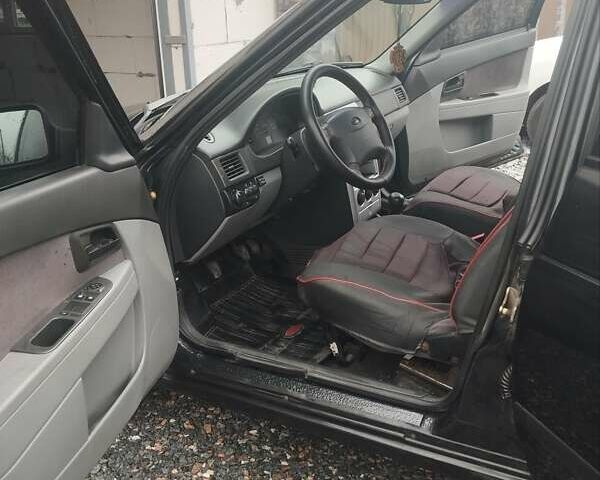 Черный ВАЗ 2170 Priora, объемом двигателя 1.6 л и пробегом 161 тыс. км за 2000 $, фото 6 на Automoto.ua