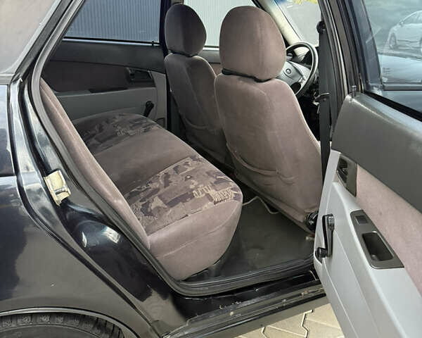 Черный ВАЗ 2170 Priora, объемом двигателя 1.6 л и пробегом 262 тыс. км за 1250 $, фото 19 на Automoto.ua