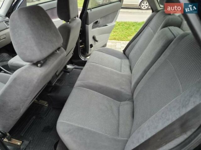 Черный ВАЗ 2170 Priora, объемом двигателя 1.6 л и пробегом 135 тыс. км за 3000 $, фото 31 на Automoto.ua