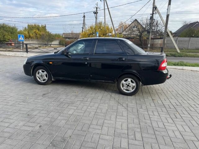 Черный ВАЗ 2170 Priora, объемом двигателя 1.6 л и пробегом 253 тыс. км за 2000 $, фото 1 на Automoto.ua