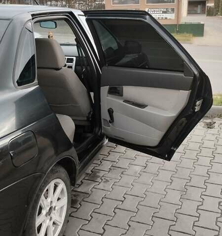 Черный ВАЗ 2170 Priora, объемом двигателя 1.6 л и пробегом 158 тыс. км за 1850 $, фото 2 на Automoto.ua