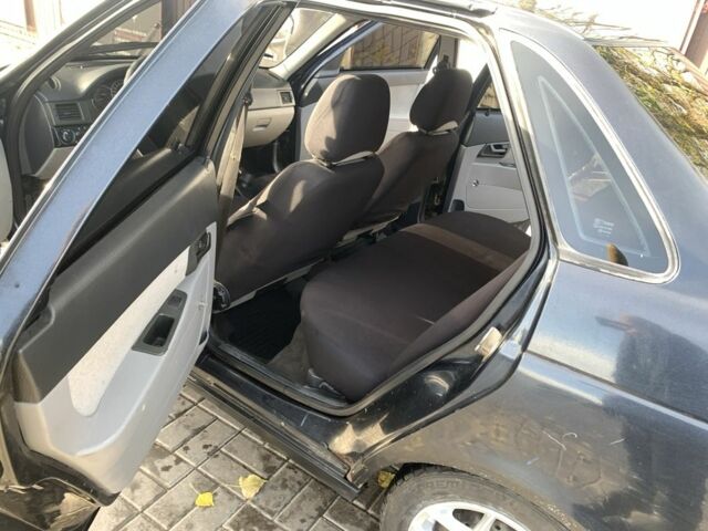 Чорний ВАЗ 2170 Priora, об'ємом двигуна 1.6 л та пробігом 130 тис. км за 1550 $, фото 12 на Automoto.ua