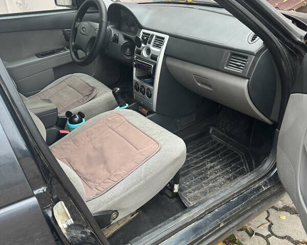 Черный ВАЗ 2170 Priora, объемом двигателя 1.6 л и пробегом 150 тыс. км за 2600 $, фото 6 на Automoto.ua