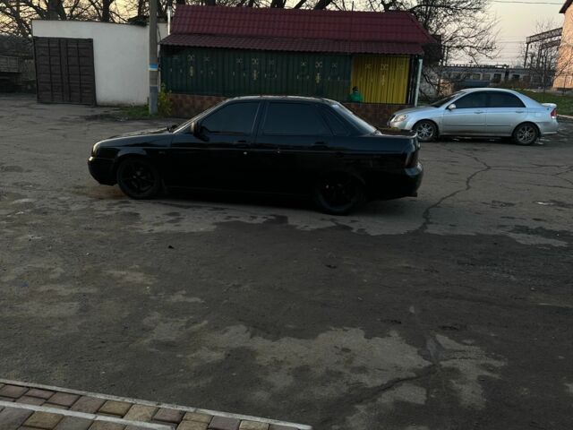 Черный ВАЗ 2170 Priora, объемом двигателя 1.6 л и пробегом 180 тыс. км за 2000 $, фото 1 на Automoto.ua