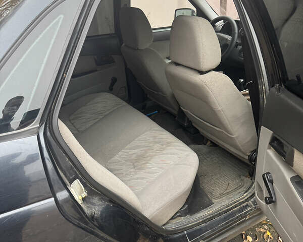 Черный ВАЗ 2170 Priora, объемом двигателя 1.6 л и пробегом 150 тыс. км за 2600 $, фото 5 на Automoto.ua