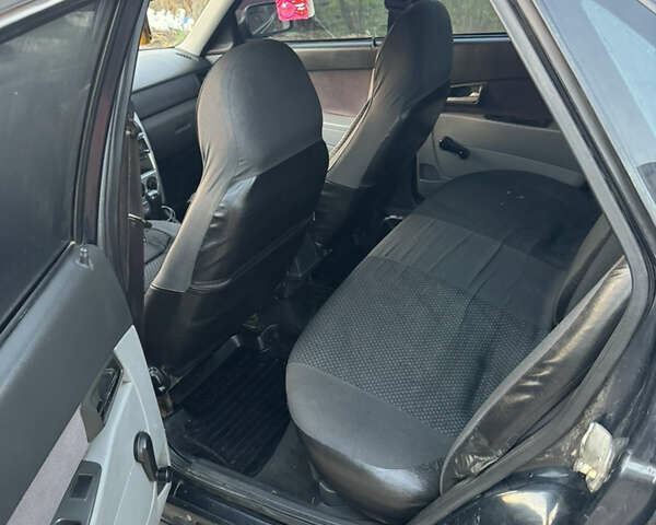 Черный ВАЗ 2170 Priora, объемом двигателя 1.6 л и пробегом 250 тыс. км за 2800 $, фото 11 на Automoto.ua