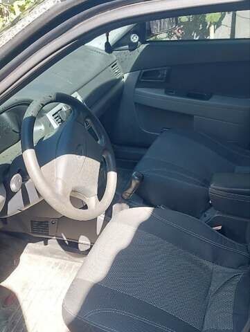 Черный ВАЗ 2170 Priora, объемом двигателя 1.6 л и пробегом 110 тыс. км за 3200 $, фото 2 на Automoto.ua