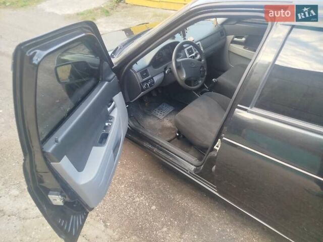 Чорний ВАЗ 2170 Priora, об'ємом двигуна 1.6 л та пробігом 142 тис. км за 2200 $, фото 22 на Automoto.ua