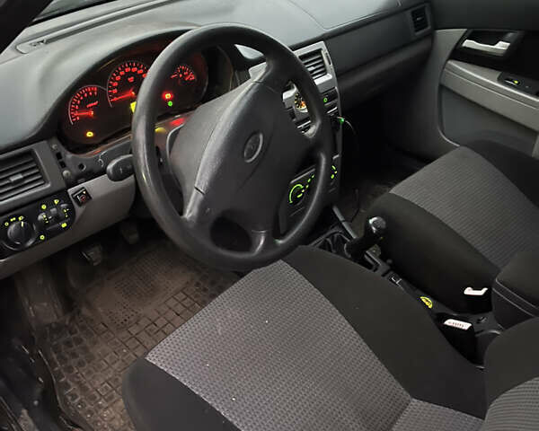 Чорний ВАЗ 2170 Priora, об'ємом двигуна 1.6 л та пробігом 999 тис. км за 1600 $, фото 4 на Automoto.ua