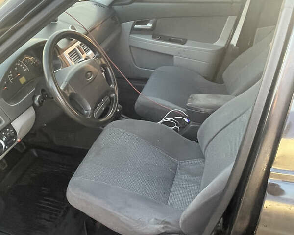 Черный ВАЗ 2170 Priora, объемом двигателя 1.6 л и пробегом 230 тыс. км за 1750 $, фото 9 на Automoto.ua