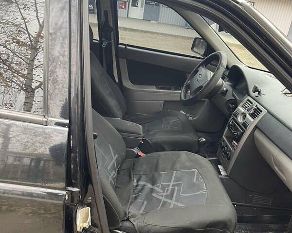 Черный ВАЗ 2170 Priora, объемом двигателя 1.6 л и пробегом 158 тыс. км за 3050 $, фото 6 на Automoto.ua