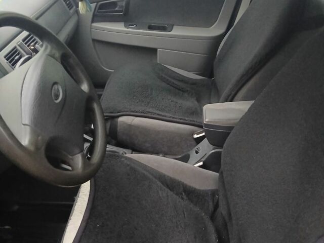 Черный ВАЗ 2170 Priora, объемом двигателя 1.6 л и пробегом 127 тыс. км за 2000 $, фото 4 на Automoto.ua