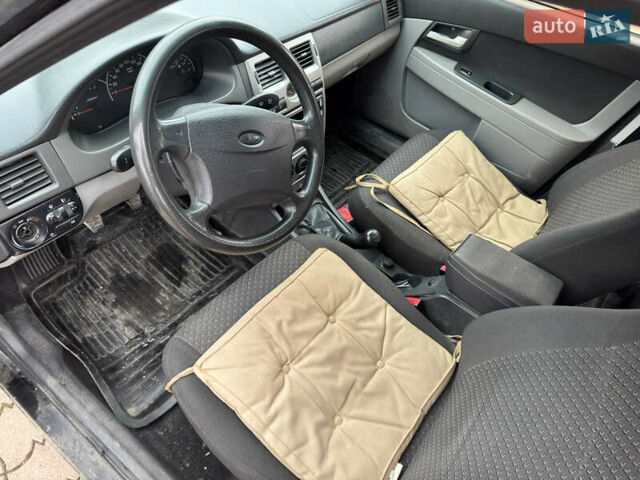 Чорний ВАЗ 2170 Priora, об'ємом двигуна 1.6 л та пробігом 165 тис. км за 1650 $, фото 9 на Automoto.ua
