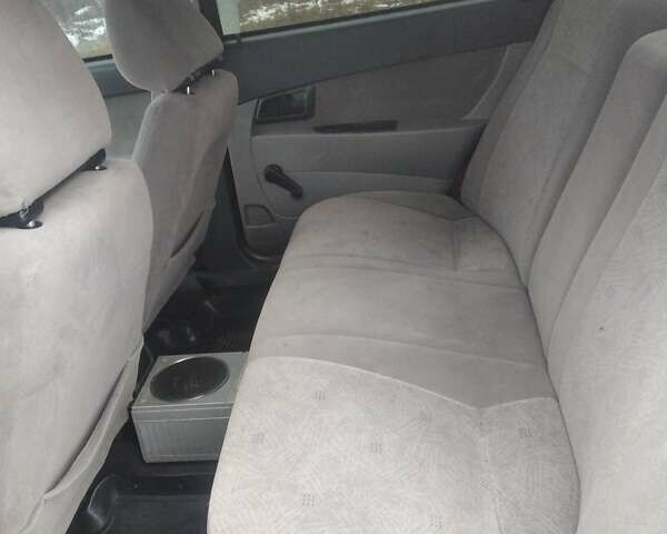 Красный ВАЗ 2170 Priora, объемом двигателя 1.6 л и пробегом 130 тыс. км за 2000 $, фото 6 на Automoto.ua