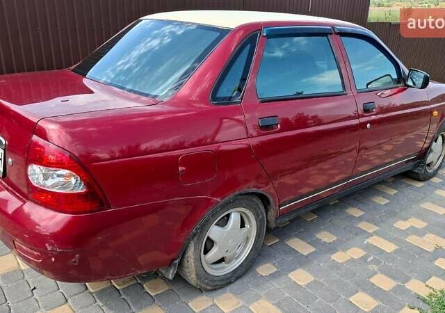 Красный ВАЗ 2170 Priora, объемом двигателя 1.6 л и пробегом 168 тыс. км за 2400 $, фото 4 на Automoto.ua