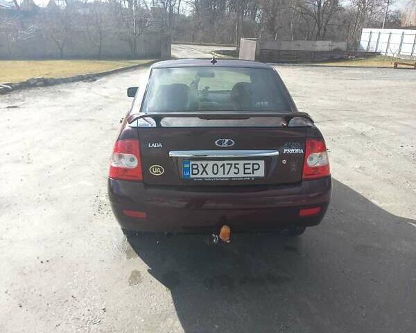 Красный ВАЗ 2170 Priora, объемом двигателя 1.6 л и пробегом 207 тыс. км за 2600 $, фото 1 на Automoto.ua