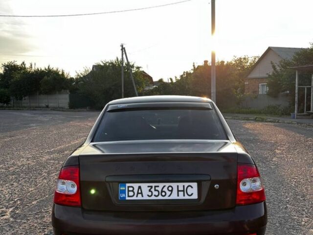 Красный ВАЗ 2170 Priora, объемом двигателя 1.6 л и пробегом 306 тыс. км за 2700 $, фото 1 на Automoto.ua
