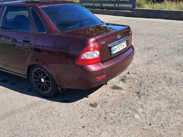 Красный ВАЗ 2170 Priora, объемом двигателя 1.6 л и пробегом 153 тыс. км за 2249 $, фото 2 на Automoto.ua