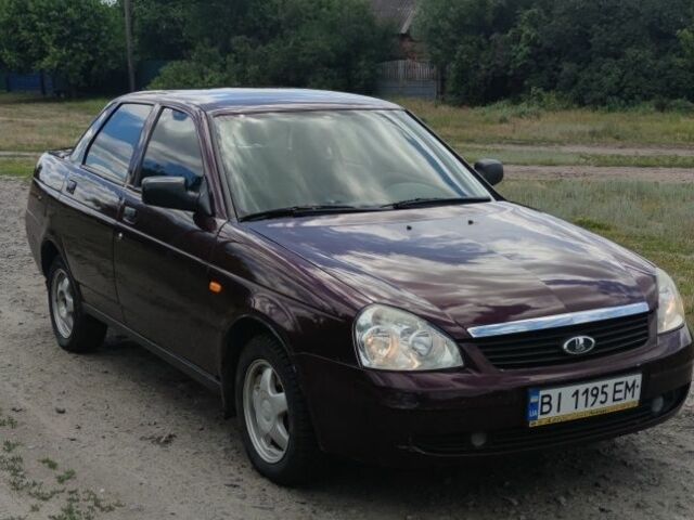 Красный ВАЗ 2170 Priora, объемом двигателя 1.6 л и пробегом 199 тыс. км за 1999 $, фото 1 на Automoto.ua